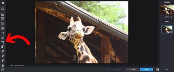 Draw a giraffe using pixlr photo editor The photo uploads. Click the adjustment icon step 2