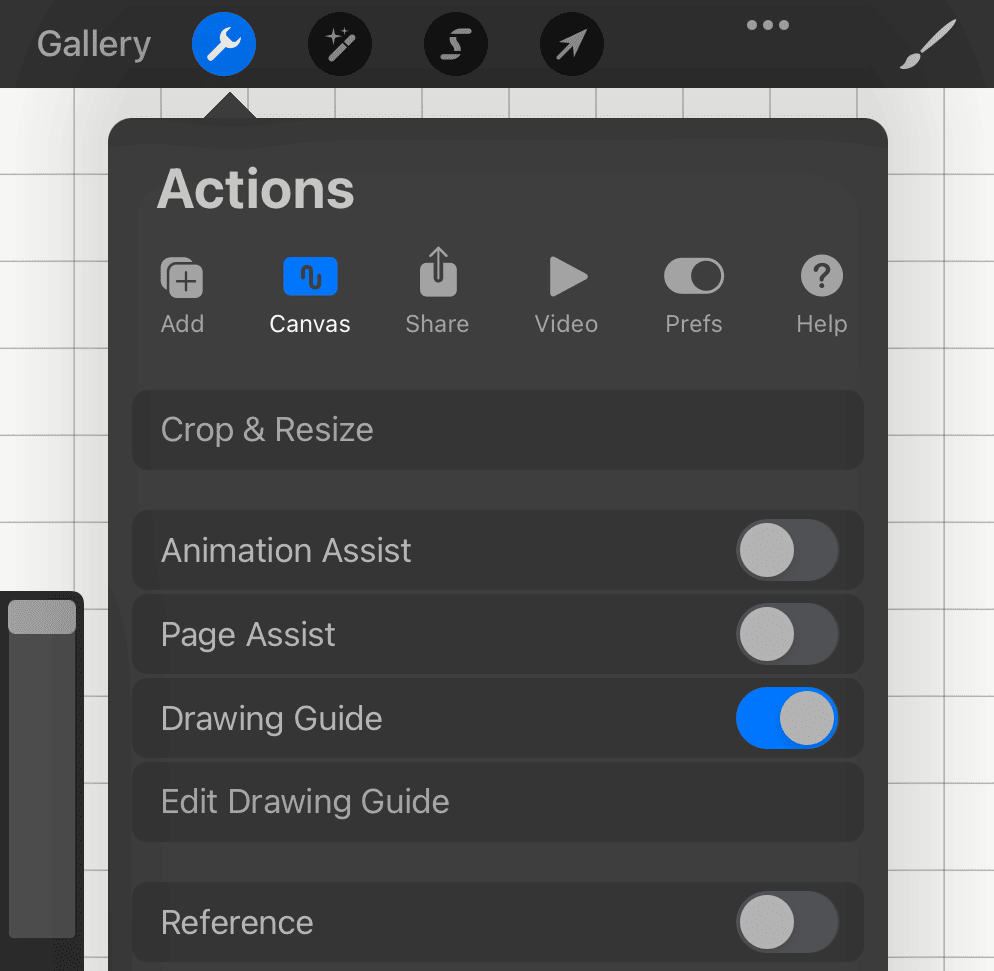 The Actions menu in Procreate. Tap the wrench icon, the canvas icon, and toggle the "Drawing Guide"